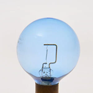 Blue headlamp bulb circa 1930. Creator: Unknown