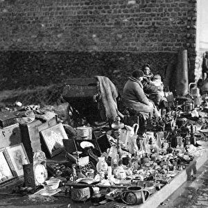 A display of goods at the flea market, Paris, 1931. Artist: Ernest Flammarion