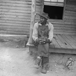 Father of sharecropper family, Person County, North Carolina, 1939. Creator: Dorothea Lange
