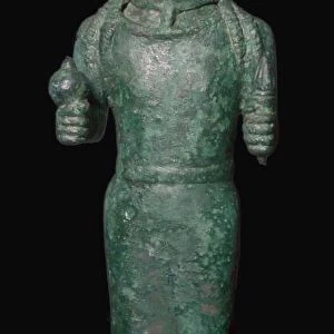Greek bronze figure holding a pomegranate