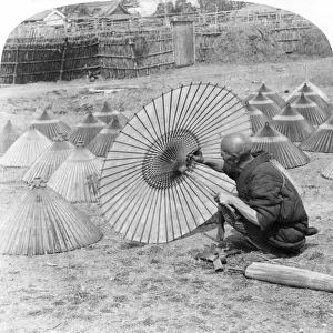 A Japanese umbrella maker, Kobe, Japan, 1896. Artist: Underwood & Underwood