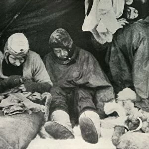 Members of the Polar Party Getting Into Their Sleeping-Bags, c1911, (1913). Artist