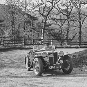 MG TA of FW Ellis competing in the RAC Rally, 1939. Artist: Bill Brunell