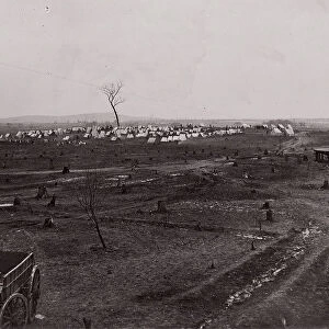 [Wagon in a landscape with army encampment in the distance]. Brady album, p. 125, 1861-65