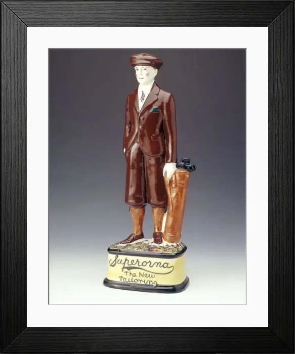 Framed Print : Pottery figure of a golfer advertising Superorna tailoring, 1920s Framed Print : Pottery figure of a golfer advertising Superorna tailoring, 1920s