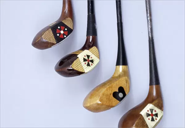 Spalding wooden clubs with coloured Fancy Face inserts, American, 1920s. Artist: Spalding