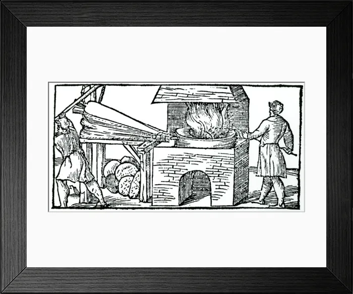 Framed Print : Using bellows to increase the draught in a furnace, 1540 Framed Print : Using bellows to increase the draught in a furnace, 1540