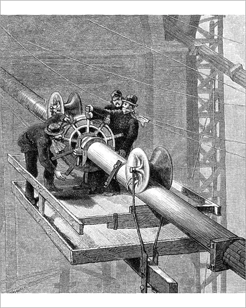 Putting wire wrapping around the suspension cables, Brooklyn Suspension Bridge, 1883