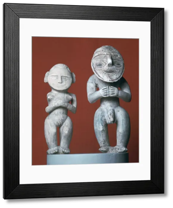 Framed Print : Male and female ancestor figures from Melanesia Framed Print : Male and female ancestor figures from Melanesia