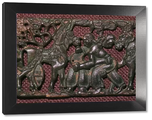 Chinese bronze harness-plaque of wrestling men, 5th century BC