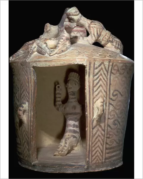 Minoan pottery shrine containing a goddess