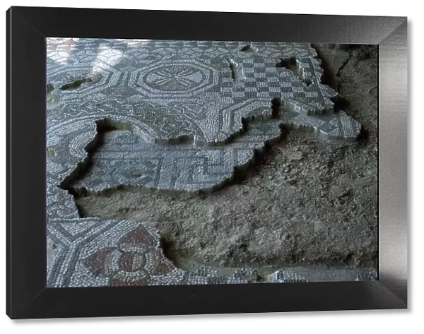 Medusa-head mosaic laid over an earlier mosaic, 3rd century