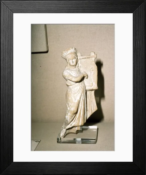 Framed Print : Greek Terracotta, Woman playing Kithera with plectrum, 3rd century BC-2nd century BC Framed Print : Greek Terracotta, Woman playing Kithera with plectrum, 3rd century BC-2nd century BC