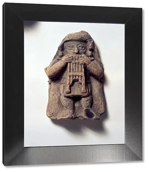 Pottery Figure of Man with Pan Pipes, from Coumbia, Pre Columbian