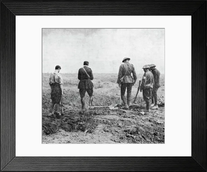 Framed Print : Chaplain conducting burial service in the field while burial party pay their respects, c1916 Framed Print : Chaplain conducting burial service in the field while burial party pay their respects, c1916