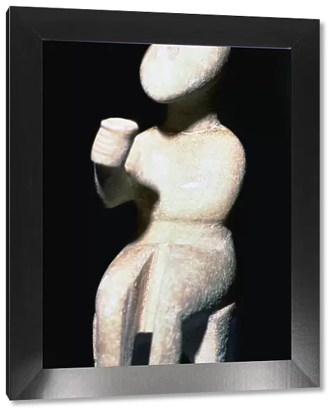 Cycladic male seated figure, 25th century BC
