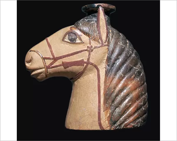 Terracotta scent bottle in the shape of a horses head
