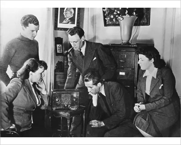 French citizens listening to a broadcast by Vichy deputy premier Admiral Darlan, 23 May, 1941