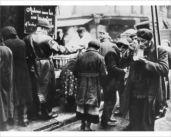 Soup kitchen for the needy, les Halles, German-occupied Paris, February 1941