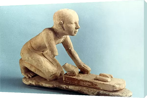 Model of a baker kneading dough and forming loaves, Ancient Egyptian