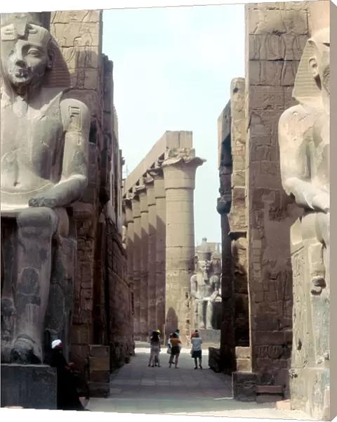 Massive Ancient Egyptian statues and columns at Luxor, Egypt