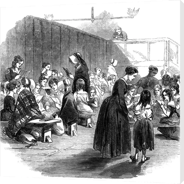 Teaching girls to read in the Ragged School Union school, Lambeth, London, 1868