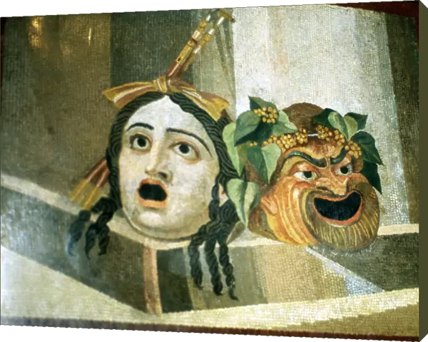 Theatrical masks of tragedy and comedy depicted in a Roman mosaic