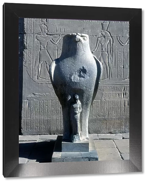 Giant statue of the Ancient Egyptian falcon-headed god Horus, Edfu, Egypt
