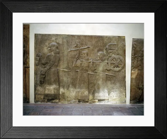 Framed Print : Assyrian relief showing servants carrying the Kings chariot, Khorsabad, c8th century BC Framed Print : Assyrian relief showing servants carrying the Kings chariot, Khorsabad, c8th century BC