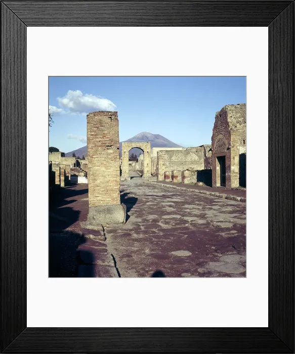 Framed Print : Road leading to Arch of Caligula with Vesuvius beyond, Pompeii, Italy Framed Print : Road leading to Arch of Caligula with Vesuvius beyond, Pompeii, Italy