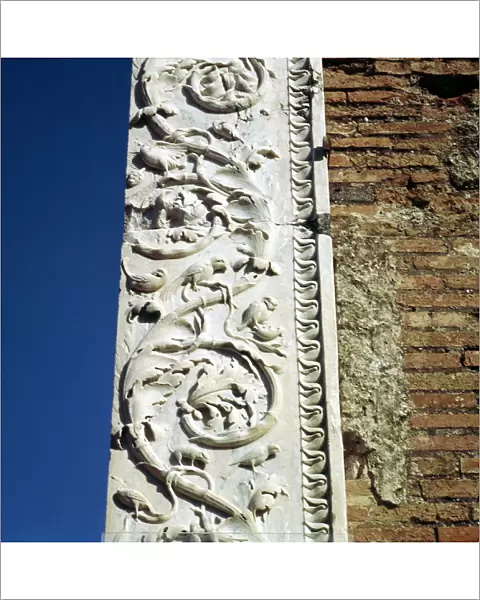 Decoration on the jamb of the dooway of the Building of Eumachia in the Forum, Pompeii, Italy