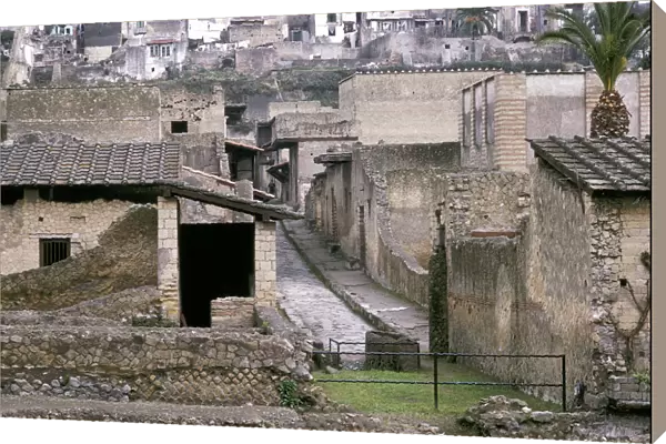 Roman houses of Herculaneum with the modern houses of Ercolano above, Italy