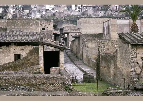 Roman houses of Herculaneum with the modern houses of Ercolano above, Italy