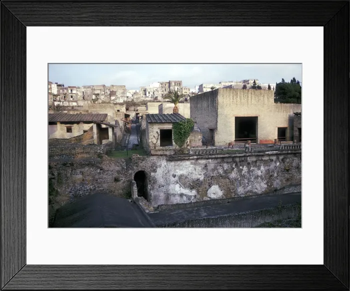 Framed Print : Buildings of Herculaneum with houses of the modern town of Ercolano above, Italy Framed Print : Buildings of Herculaneum with houses of the modern town of Ercolano above, Italy
