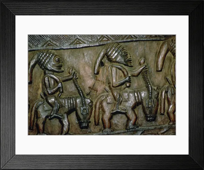 Framed Print : A carved wooden door from Nigeria depicting men on horseback Framed Print : A carved wooden door from Nigeria depicting men on horseback