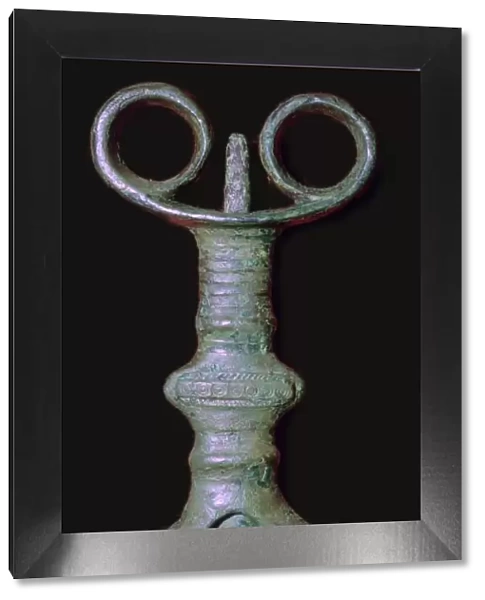 Hilt of an early bronze sword, 7th century BC