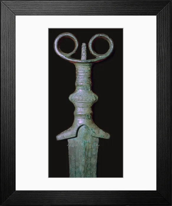 Framed Print : Hilt of an early bronze sword, 7th century BC Framed Print : Hilt of an early bronze sword, 7th century BC