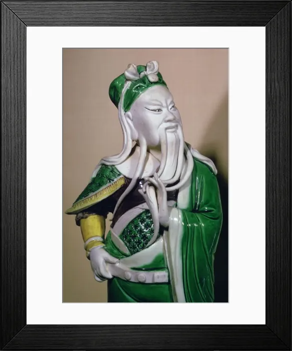 Framed Print : A porcelain figure of Kuan-ti, a war-god, 17th century Framed Print : A porcelain figure of Kuan-ti, a war-god, 17th century