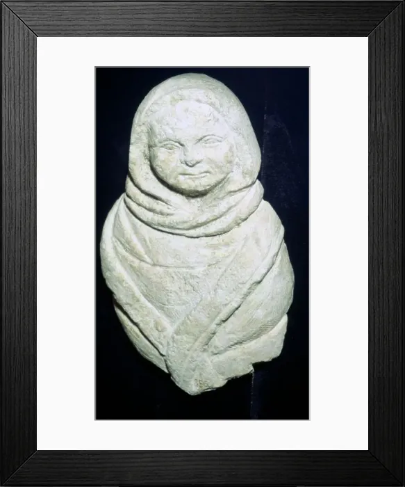 Framed Print : Celtic Stone Votive Figure of a Child Framed Print : Celtic Stone Votive Figure of a Child