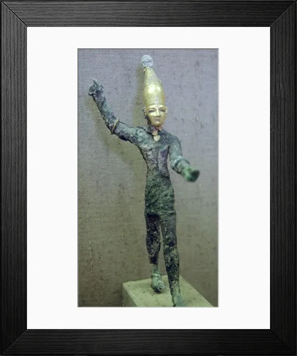 Framed Print : Gold and bronze statuette of Baal hurling a thunderbolt Framed Print : Gold and bronze statuette of Baal hurling a thunderbolt
