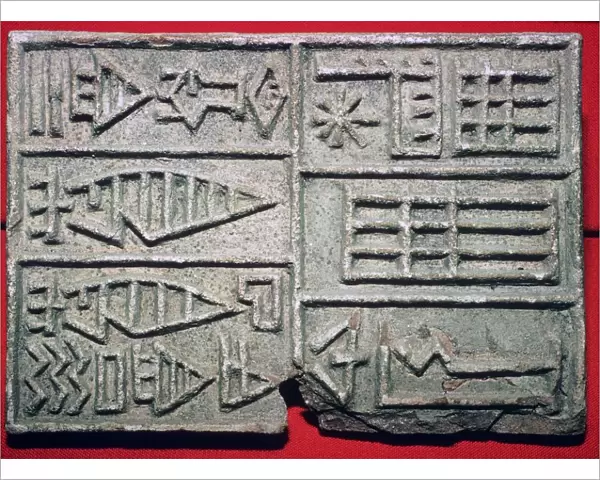 Akkadian inscription on a brick-stamp of baked clay
