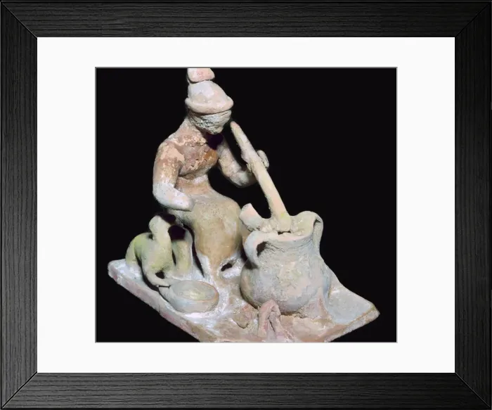 Framed Print : Greek terracotta statuette of a woman cooking Framed Print : Greek terracotta statuette of a woman cooking