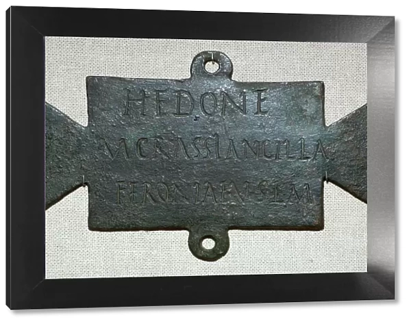 Second century Roman bronze plaque with a dedication to Feronia