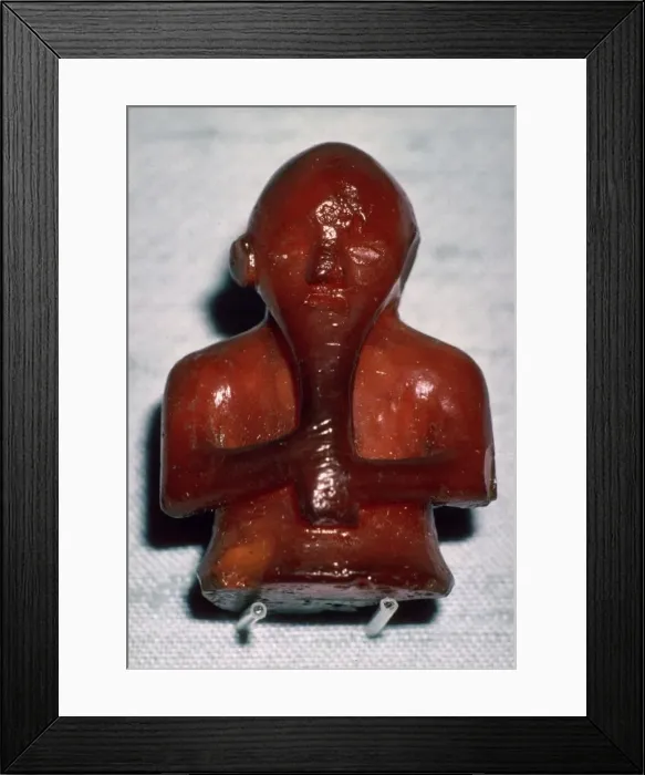 Framed Print : Amber Viking playing piece, 8th-11th century Framed Print : Amber Viking playing piece, 8th-11th century