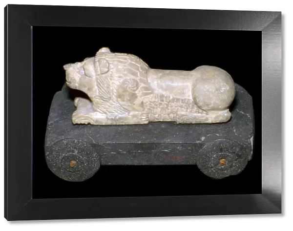 Persian lion mounted on a wheeled carriage