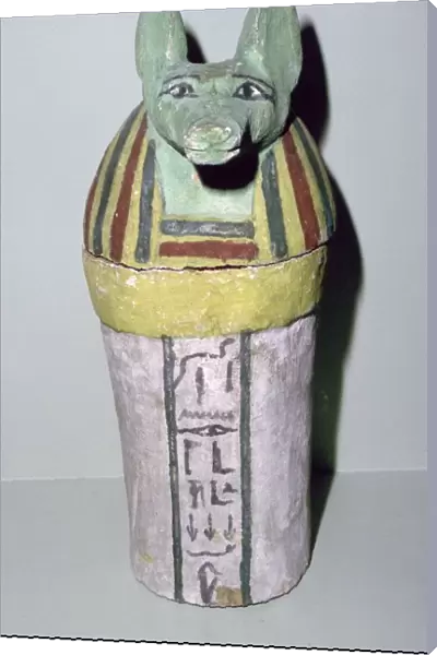 Jackal-headed wooden canopic jar for the storage of organs, Egyptian, 25th Dynasty, c700 BC