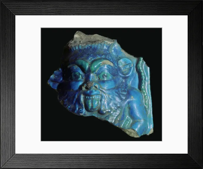 Framed Print : Egyptian faience head of Bes Framed Print : Egyptian faience head of Bes