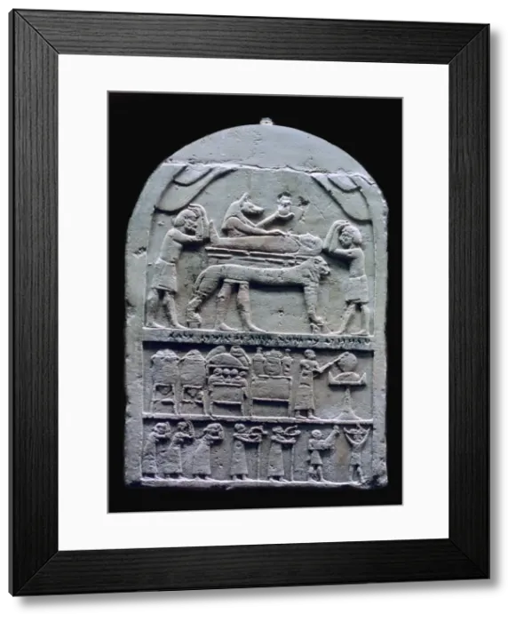 Framed Print : Egyptian stele showing Anubis preparing a mummy Framed Print : Egyptian stele showing Anubis preparing a mummy