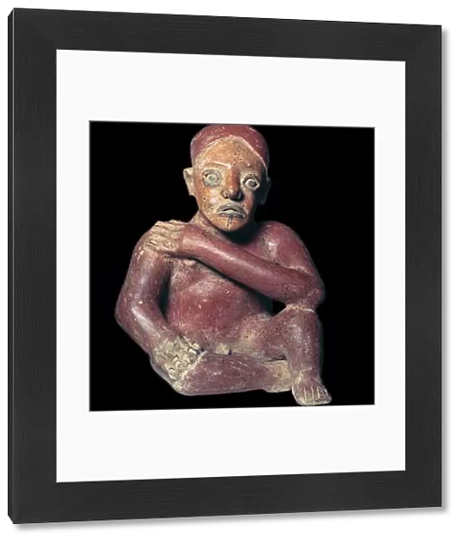 Mexican pottery figure of a squatting man, 4th century