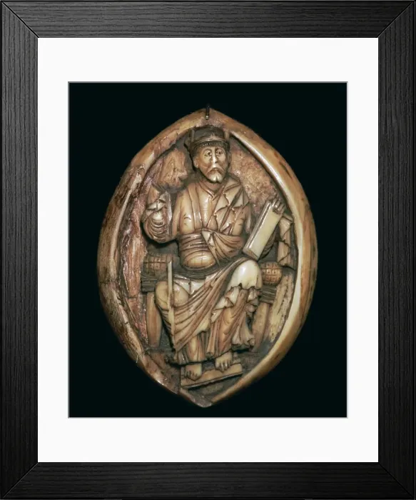 Framed Print : Anglo-Saxon carving of a man writing a book, 10th century Framed Print : Anglo-Saxon carving of a man writing a book, 10th century